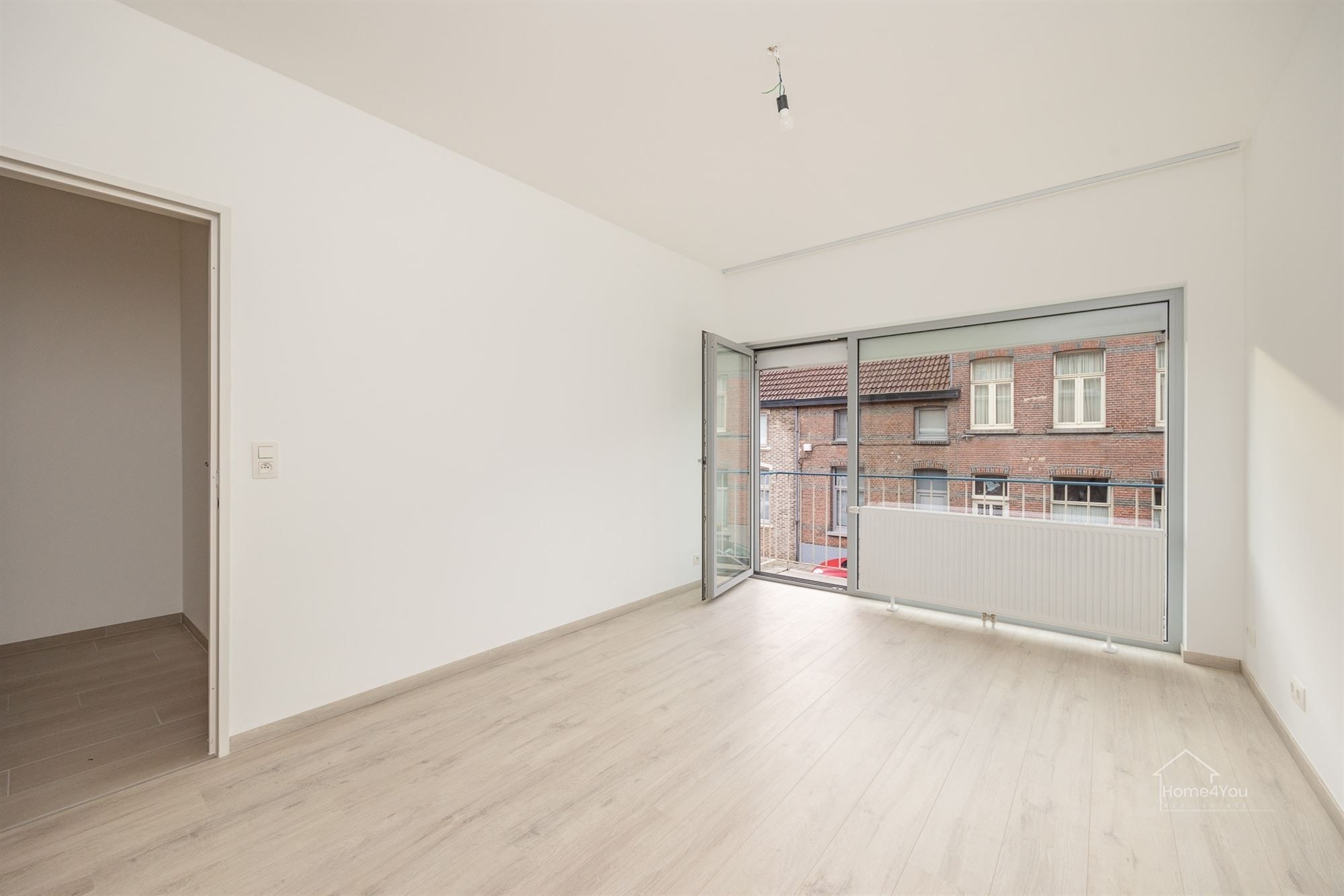 Vernieuwd en zonnig 2 slaapkamer appartement foto 11