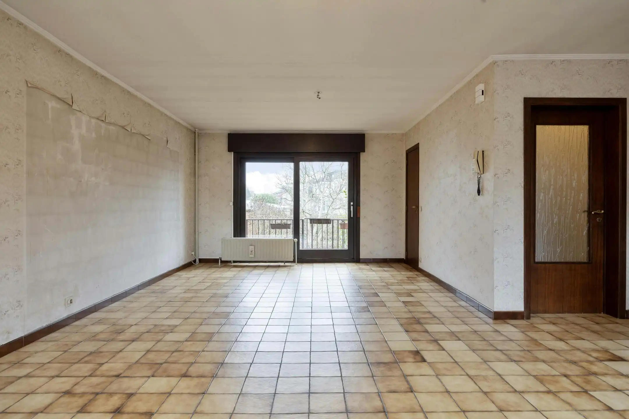 Op te frissen gezinswoning met inpandige garage en tuin op toplocatie in Strombeek! foto 5