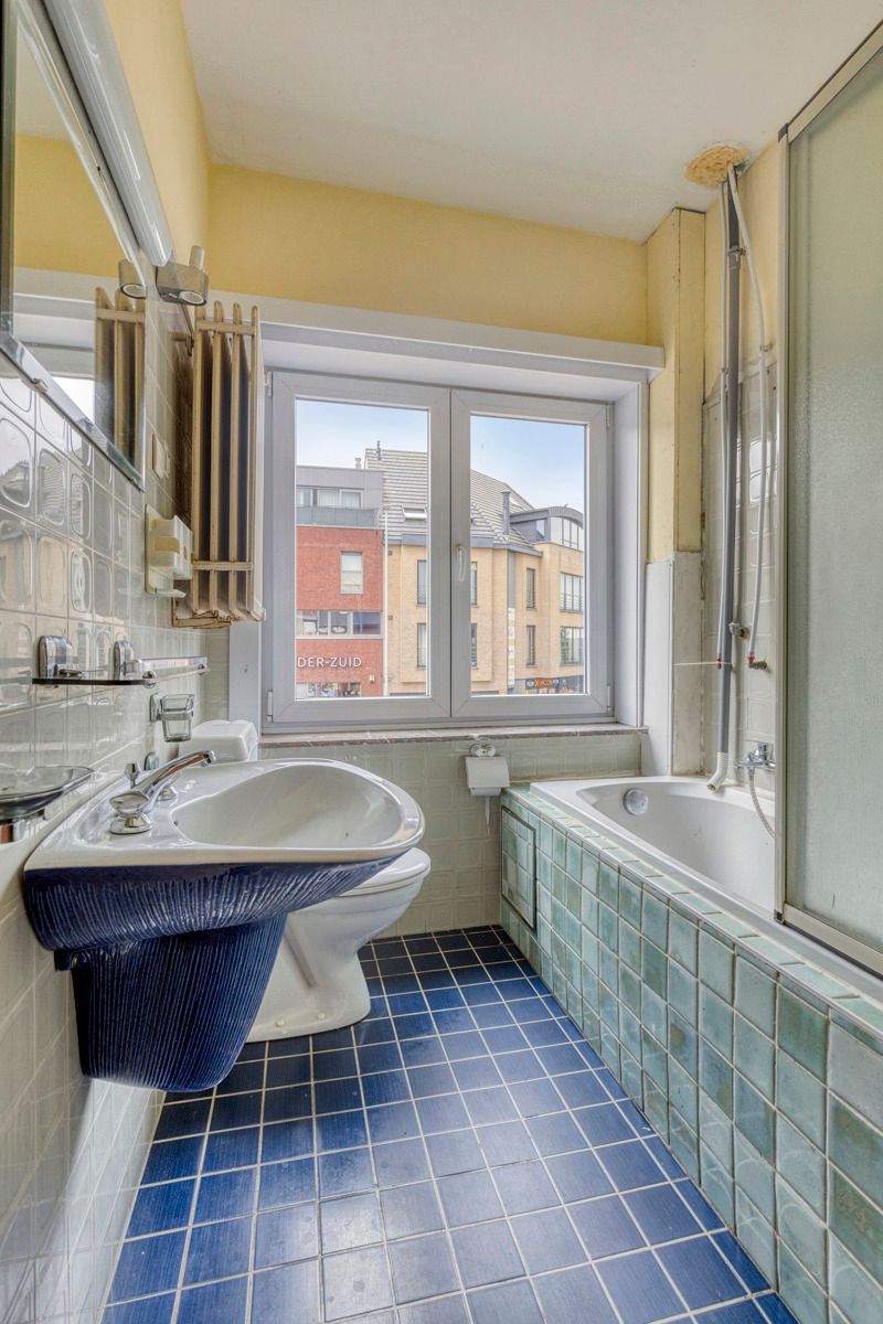 Centraal gelegen rijwoning met 4 slaapkamers foto 9