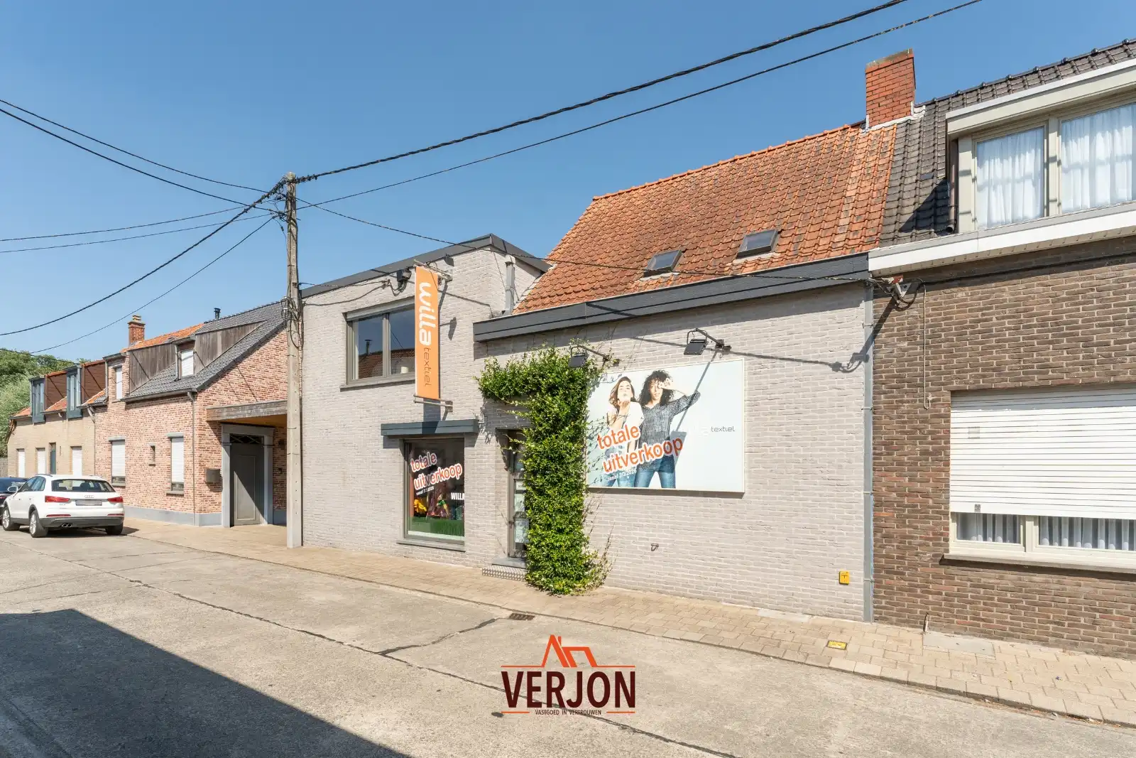 Unieke handelswoning met uitstekend draaiende winkel in centrum Beveren! foto 4