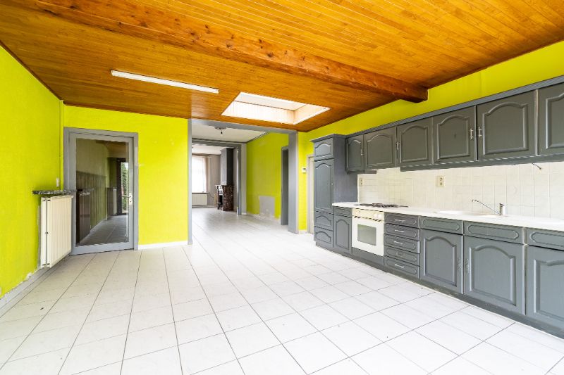 Ruime en veelzijdige rijwoning met garage achteraan en aparte ingang foto 8