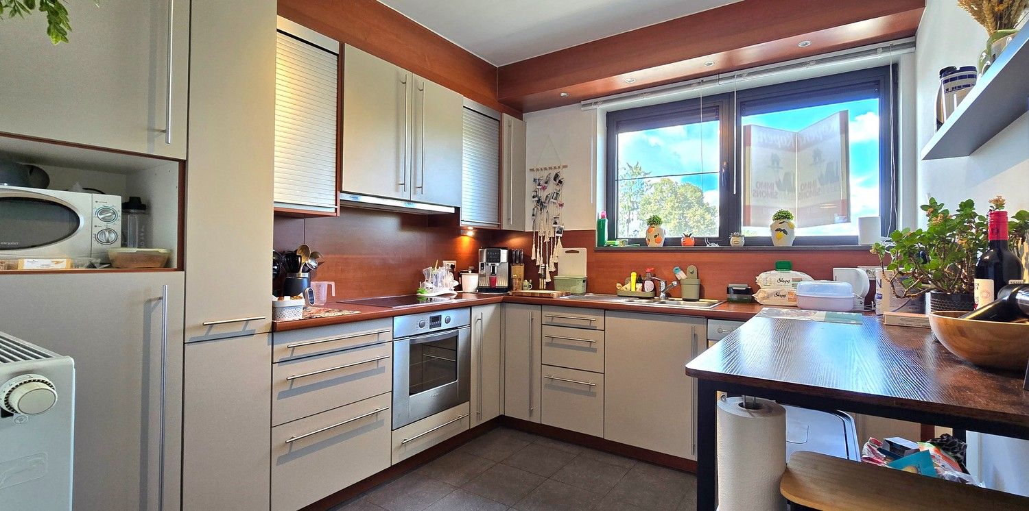 TE KOOP: Instapklaar appartement met 3 slaapkamers, dubbele garage en 2 terrassen foto 8