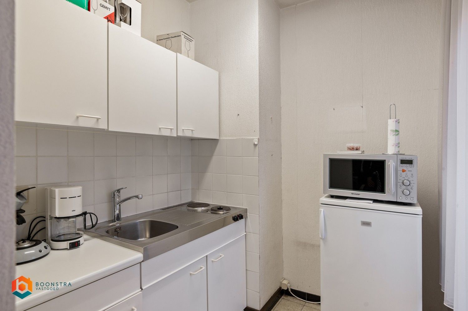 Veelzijdig handelspand met bouwgrond in centrum Rijmenam foto 17