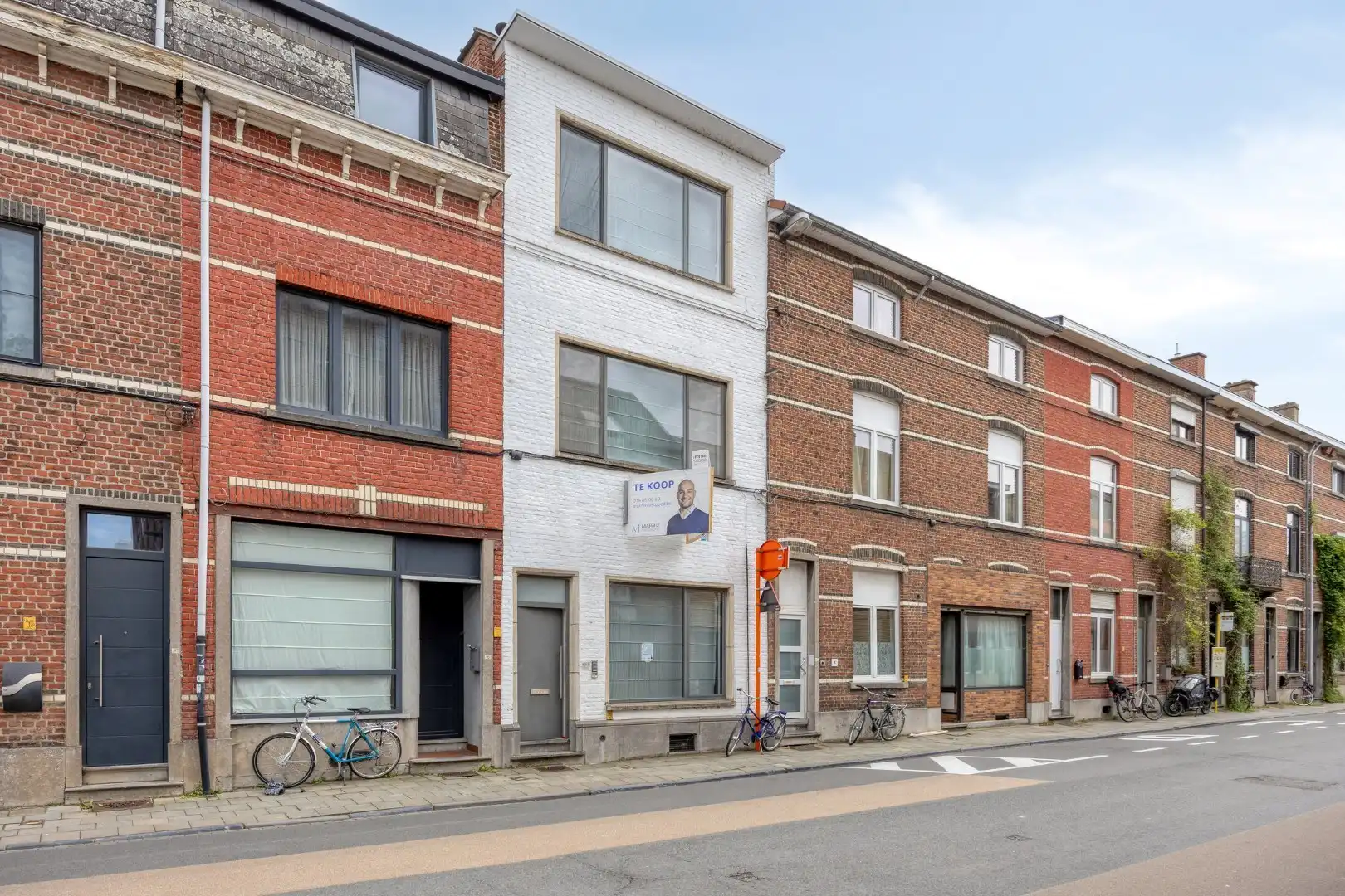 Ruime stadswoning met achteruitgang via Janseniusstraat met 4 slaapkamers, garage en tuin te Leuven- EPC 239kwh/m2 foto 2