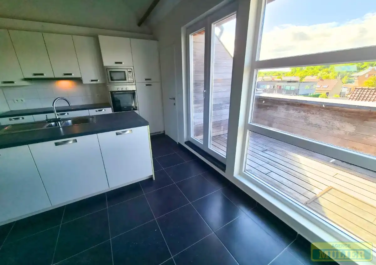 MODERN APPARTEMENT AAN DE ZONNEKANT TE KOOP IN DE PANNE foto 11