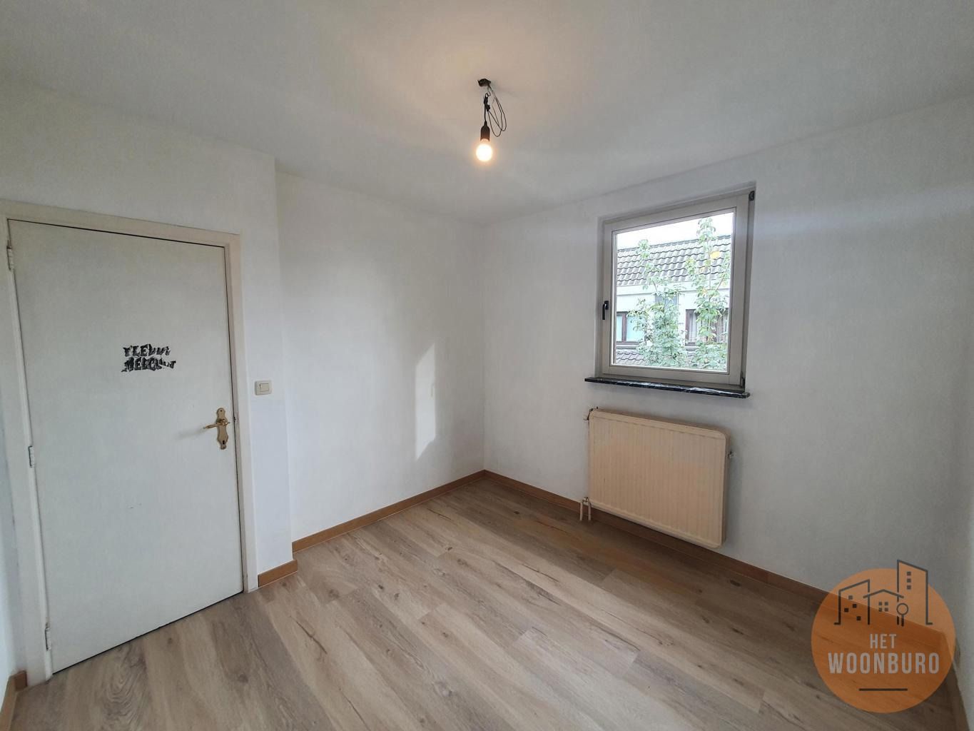 Woning open bebouwing met garage en tuin foto 12