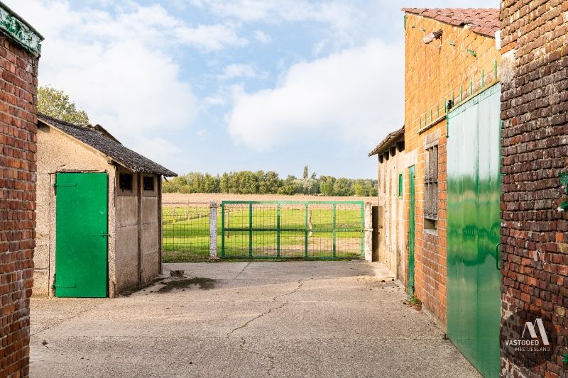 Uniek stuk bouwgrond met 2 hectare landbouwgrond foto 14