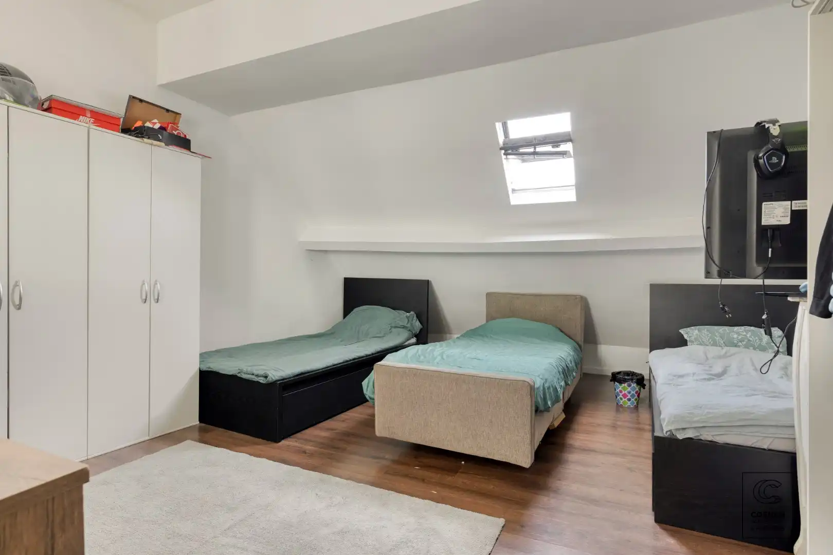 Ruime handelswoning, momenteel ingericht als handelsruimte en 2 appartementen op goede ligging te Antwerpen! foto 9