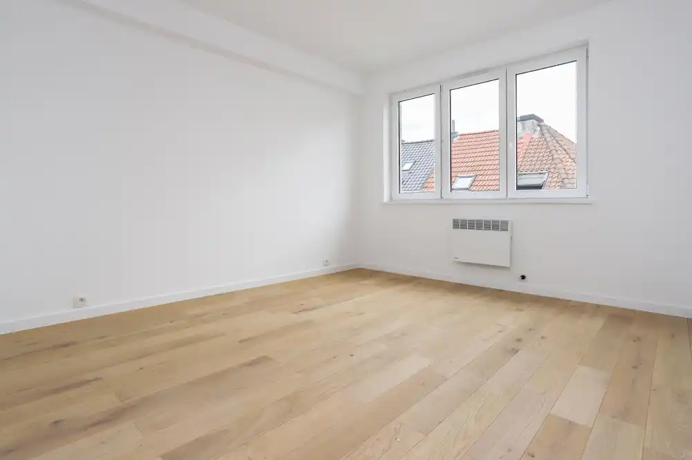 Lichtrijk en energiezuinig 2-slaapkamerappartement met lift, terras en kelderruimte foto 7