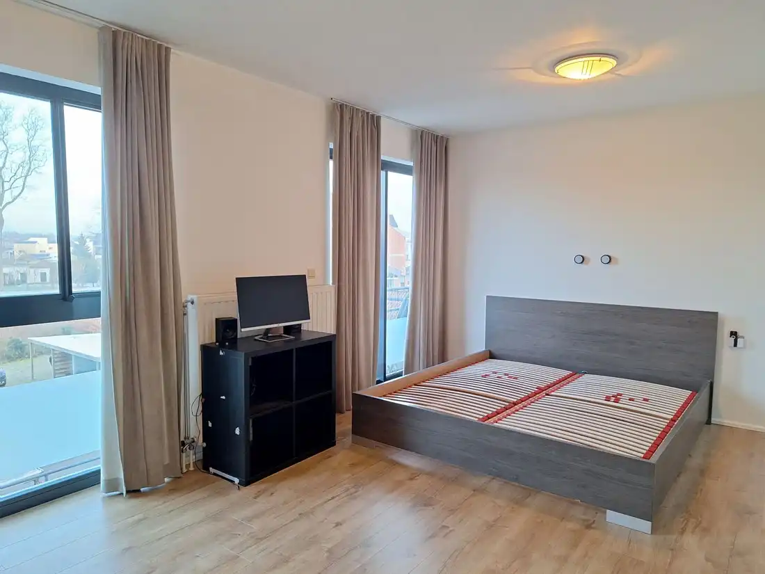 Instapklaar appartement met terras en autostandplaats in hartje Beringen foto 12