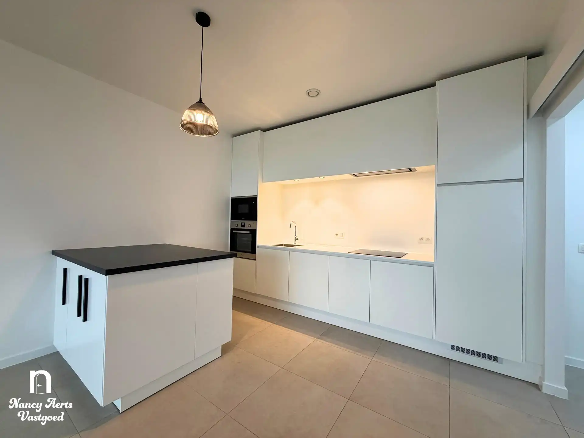 Energiezuinig 1-slaapkamerappartement in hartje Beringen foto 4