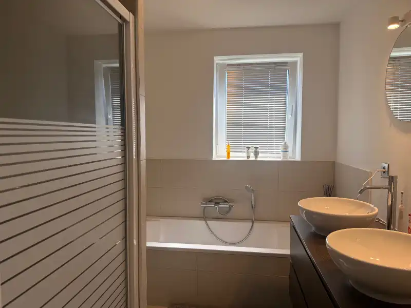 Gezellige half-open passiefwoning met zonnige tuin foto 9