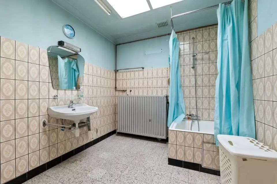 TE RENOVEREN GEZINSWONING MET GARAGE IN HET CENTRUM VAN GINGELOM foto 15