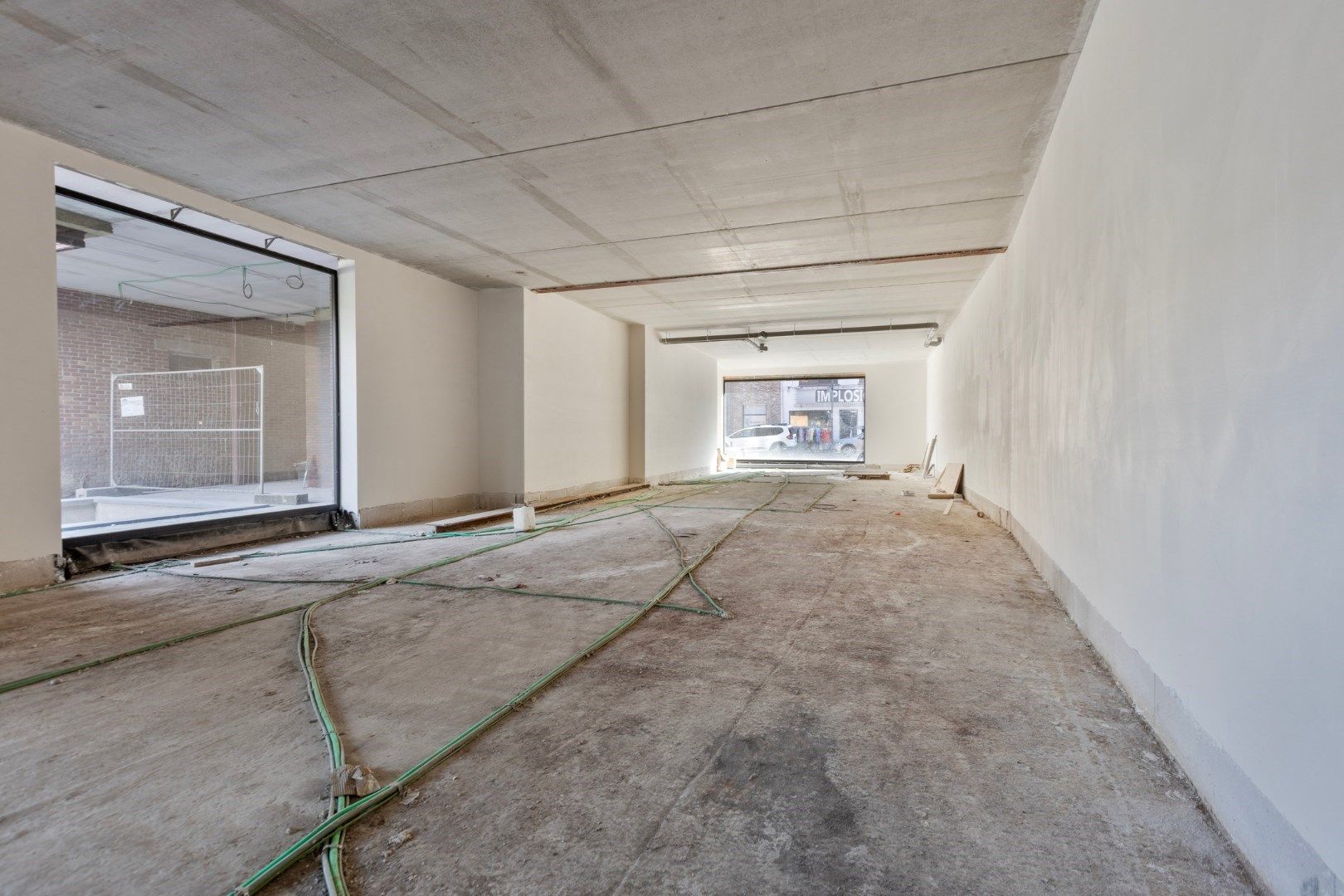 GELIJKVLOERS HANDELSPAND met KELDERRUIMTE TE HUUR/TE KOOP OP A-LOCATIE IN HOUTHALEN CENTRUM   foto 8