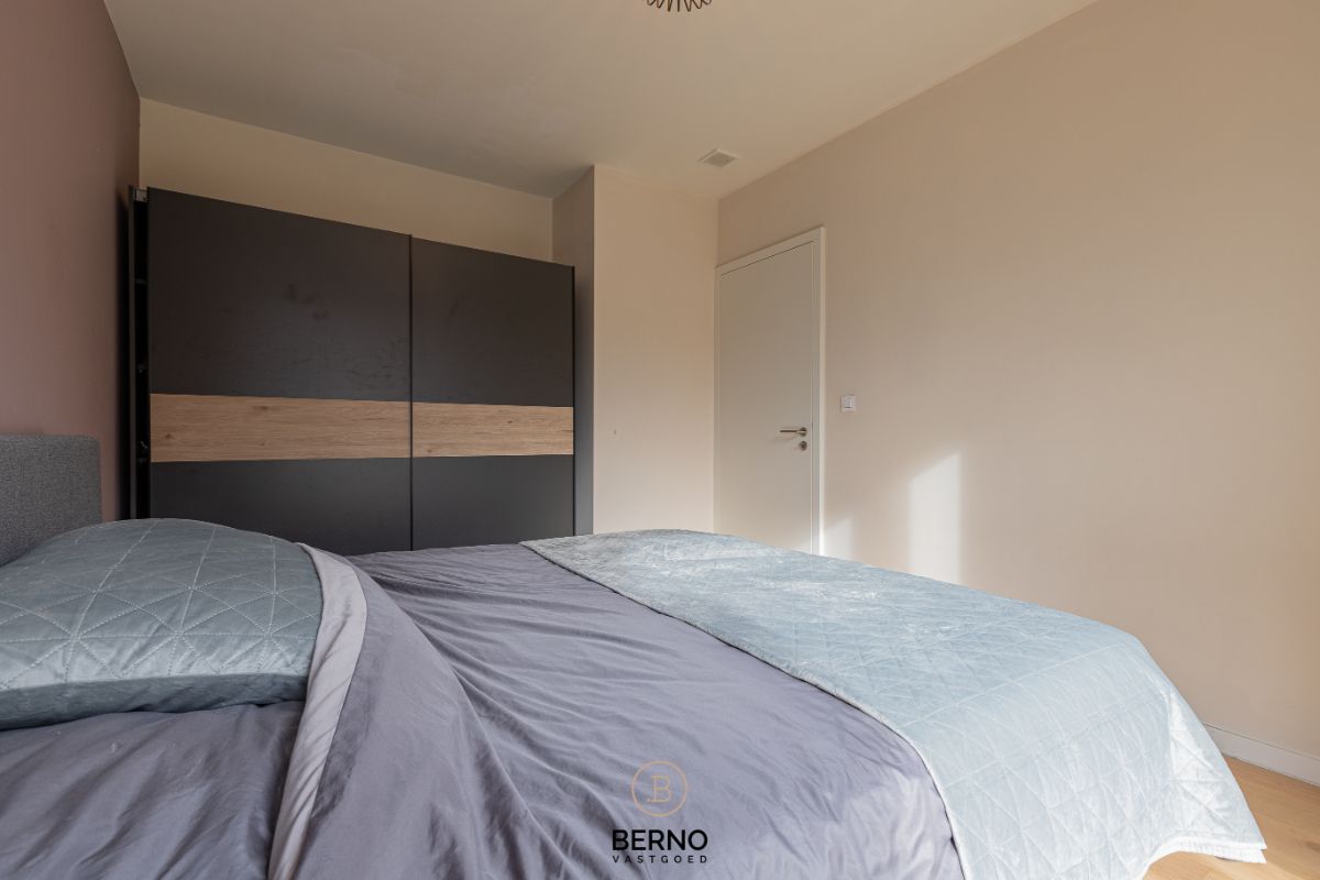 Recent gelijkvloers appartement met zonnig terras en tuintje in Opstal foto 11