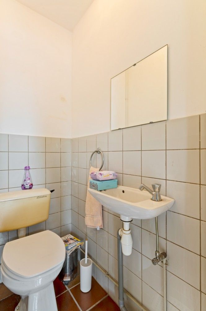 Op te frissen woning met 4 à 5 slpk., inpandige garage en zuidwest-tuin foto 22