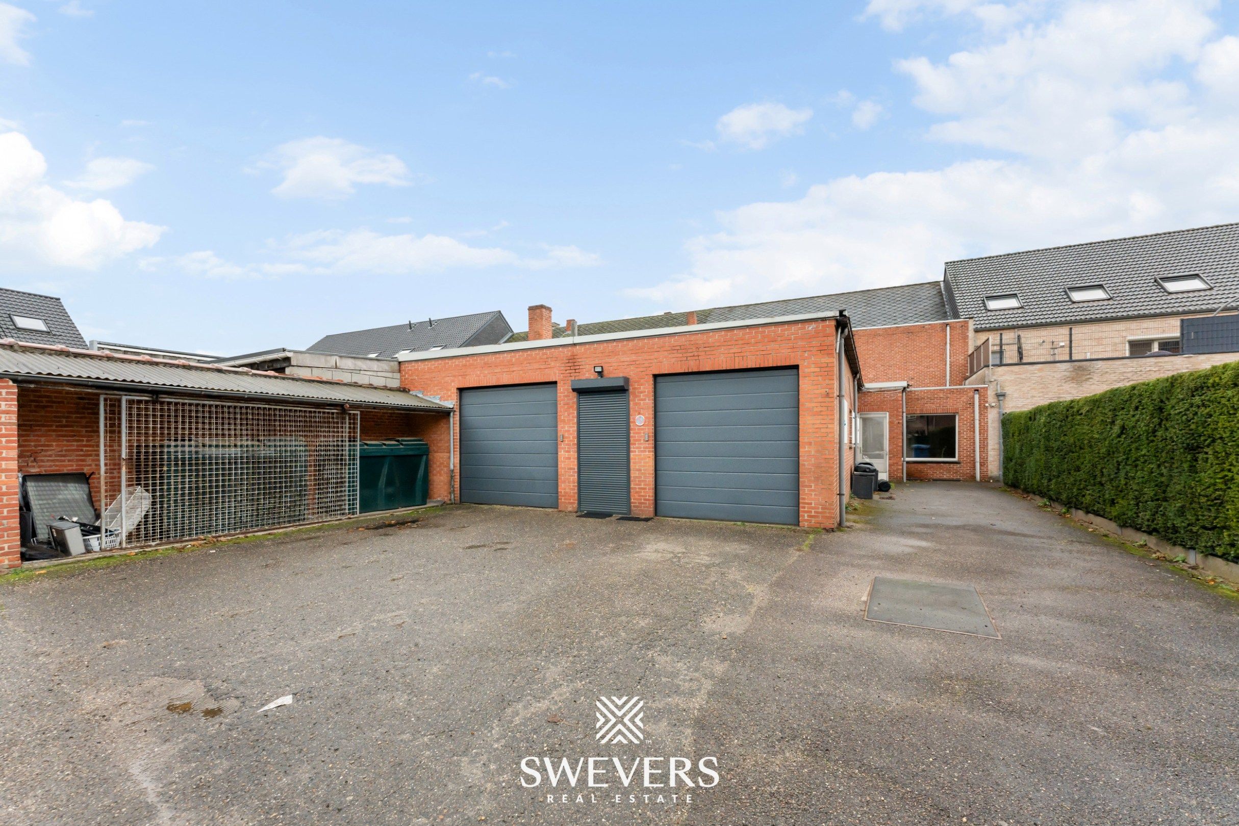 Opbrengsteigendom met handelspand, ruim appartement en uitbreidingspotentieel in hartje Heusden-Zolder foto 49