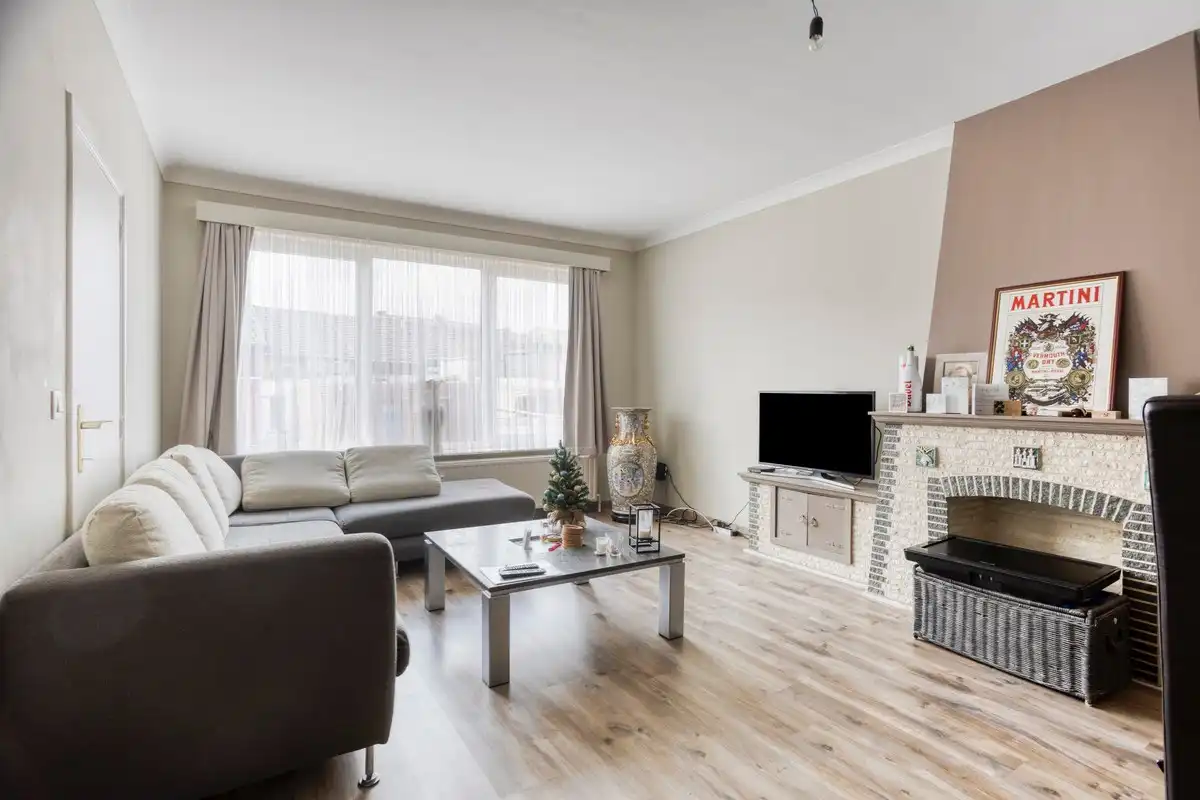 Opbrengsteigendom met 3 appartementen, garages en tuin foto 13