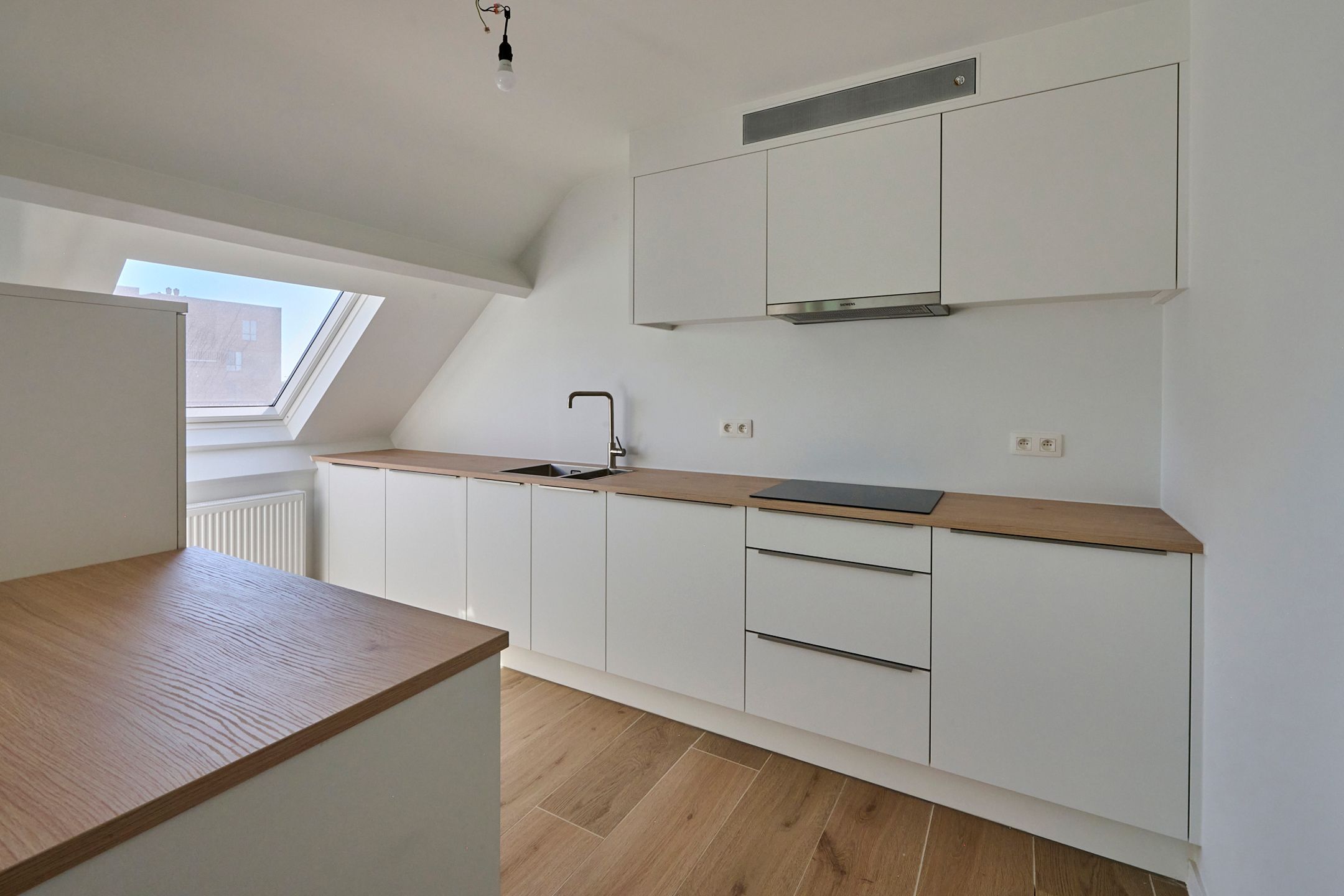 Volledig gerenoveerd penthouse (112m²) + zuidgericht terras foto 5