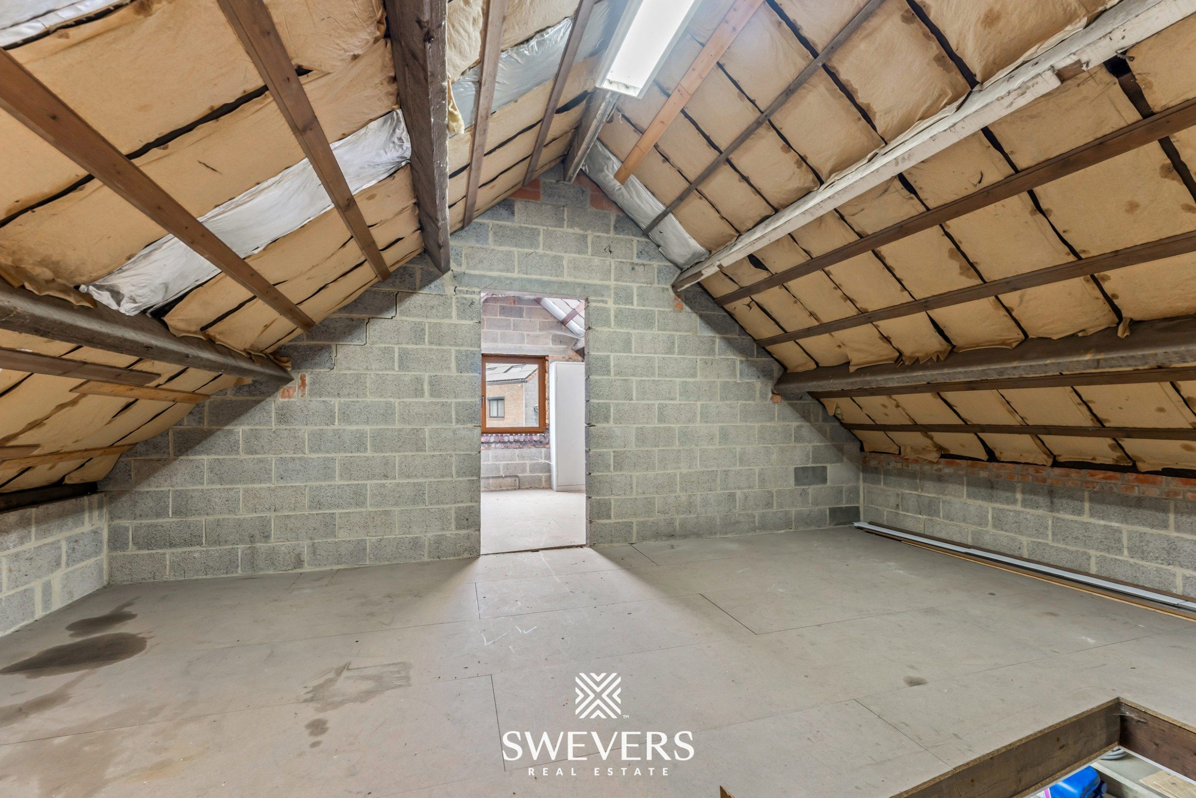 Instapklaar handelspand met woonst en tuin in Herk-de-Stad foto 24