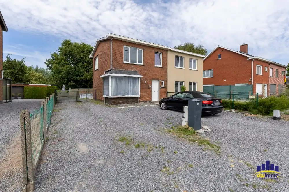 Hoofdfoto van de publicatie: Ruime halfopen bebouwing met grote tuin in Lochristi opp. 688m²
