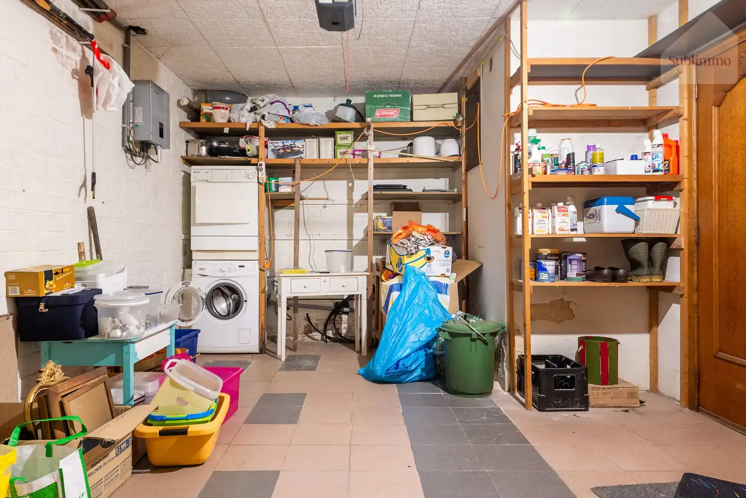 Opbrengsteigendom met 2 appartementen, tuin en garages te koop in Mol centrum foto 12