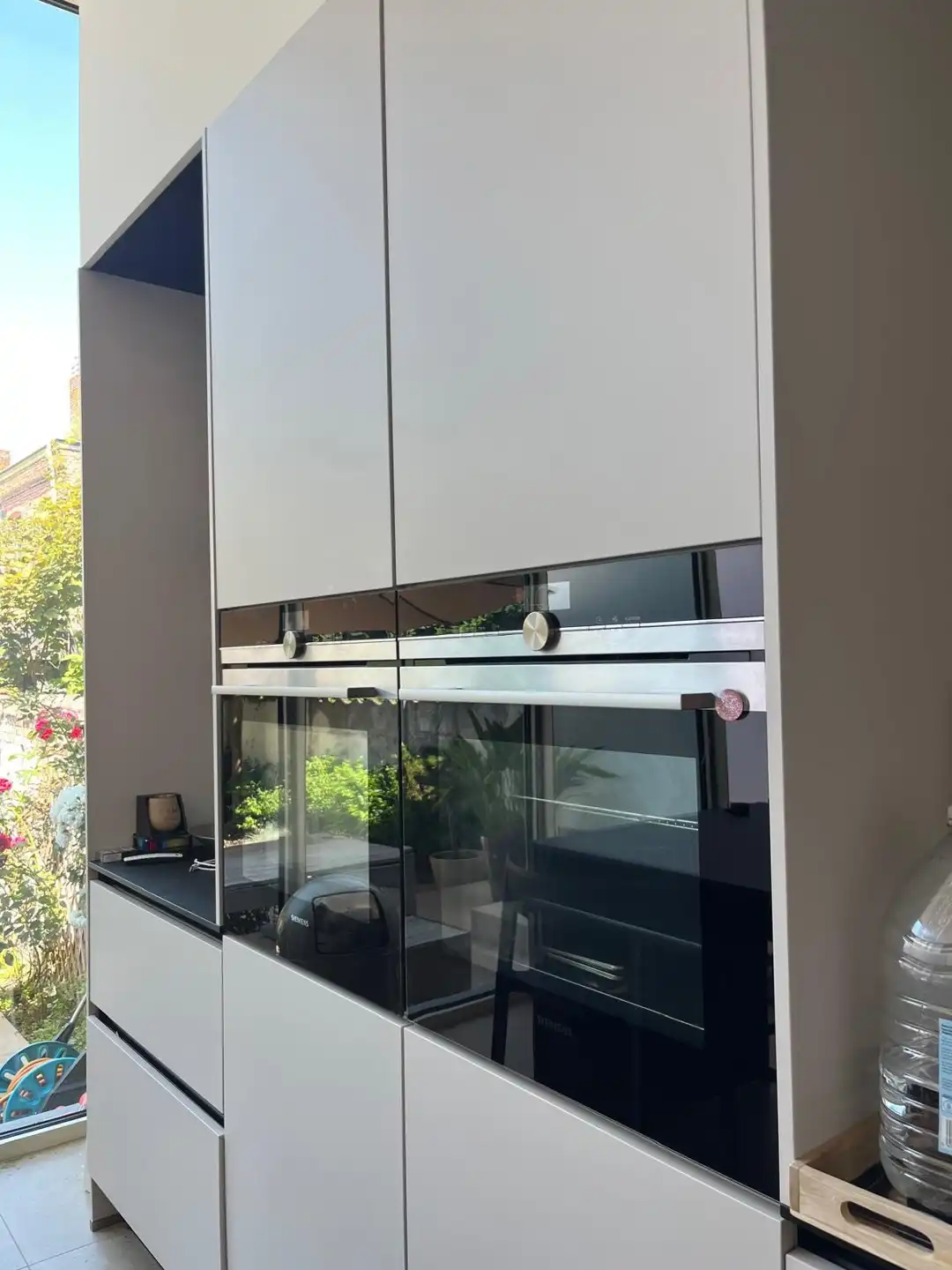 In het centrum gel. stadswoning met 5 slpk., terras, tuin en garage foto 38