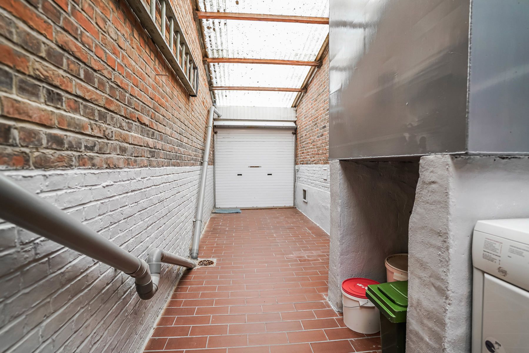 Te renoveren rijwoning met tuin te Steenhuffel foto 24