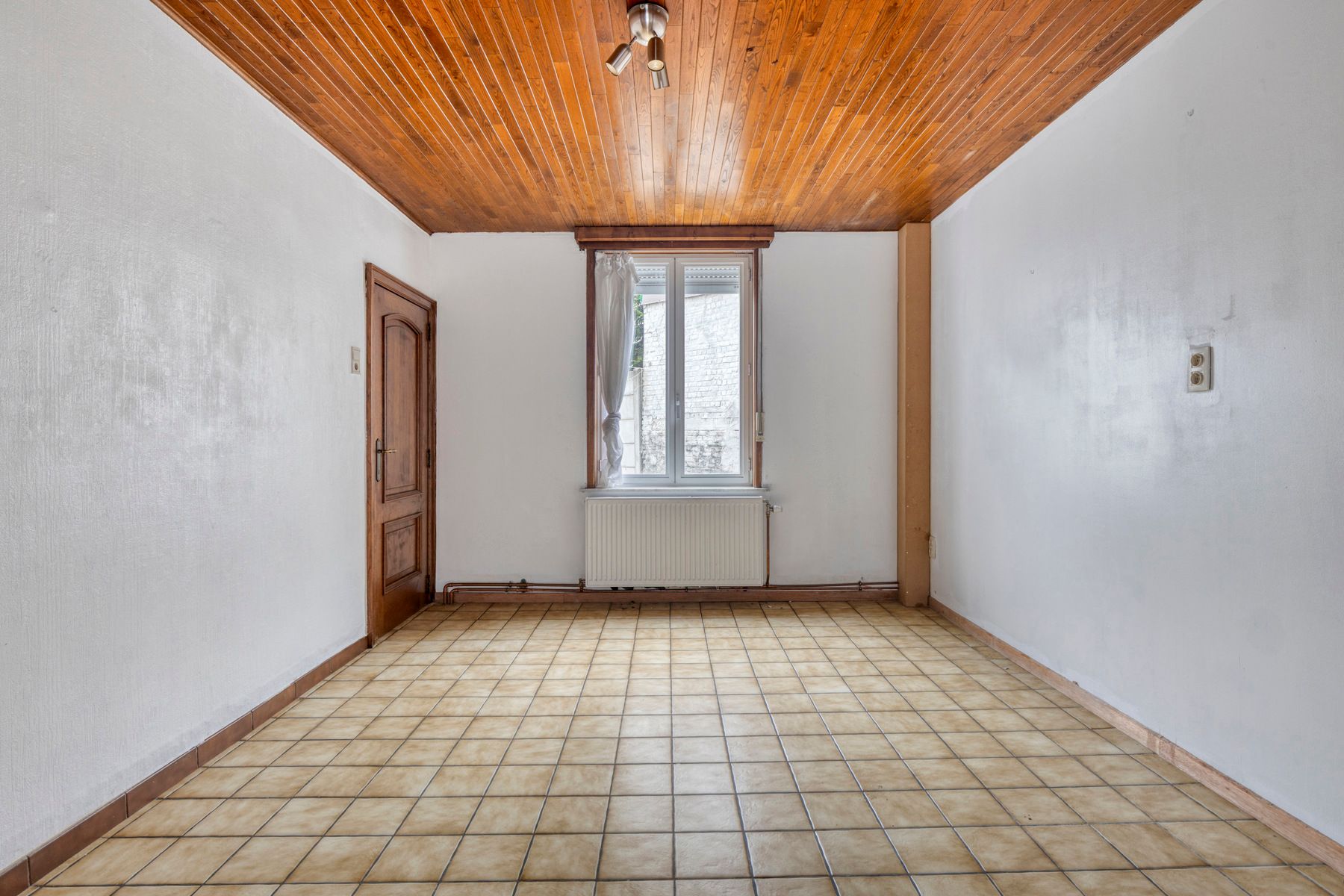 Te renoveren woning met zuidgerichte tuin foto 6