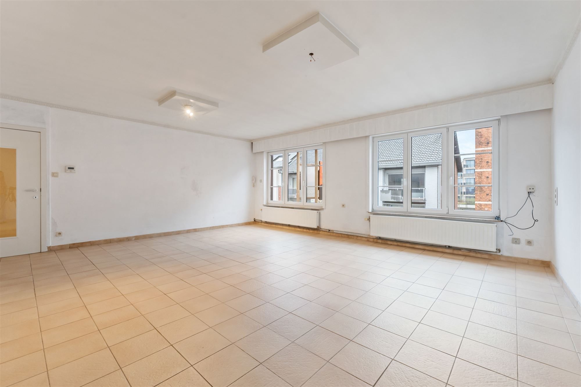 VERNIEUWD APPARTEMENT MET 2 SLAAPKAMERS PAL IN HET CENTRUM VAN BERINGEN foto 2
