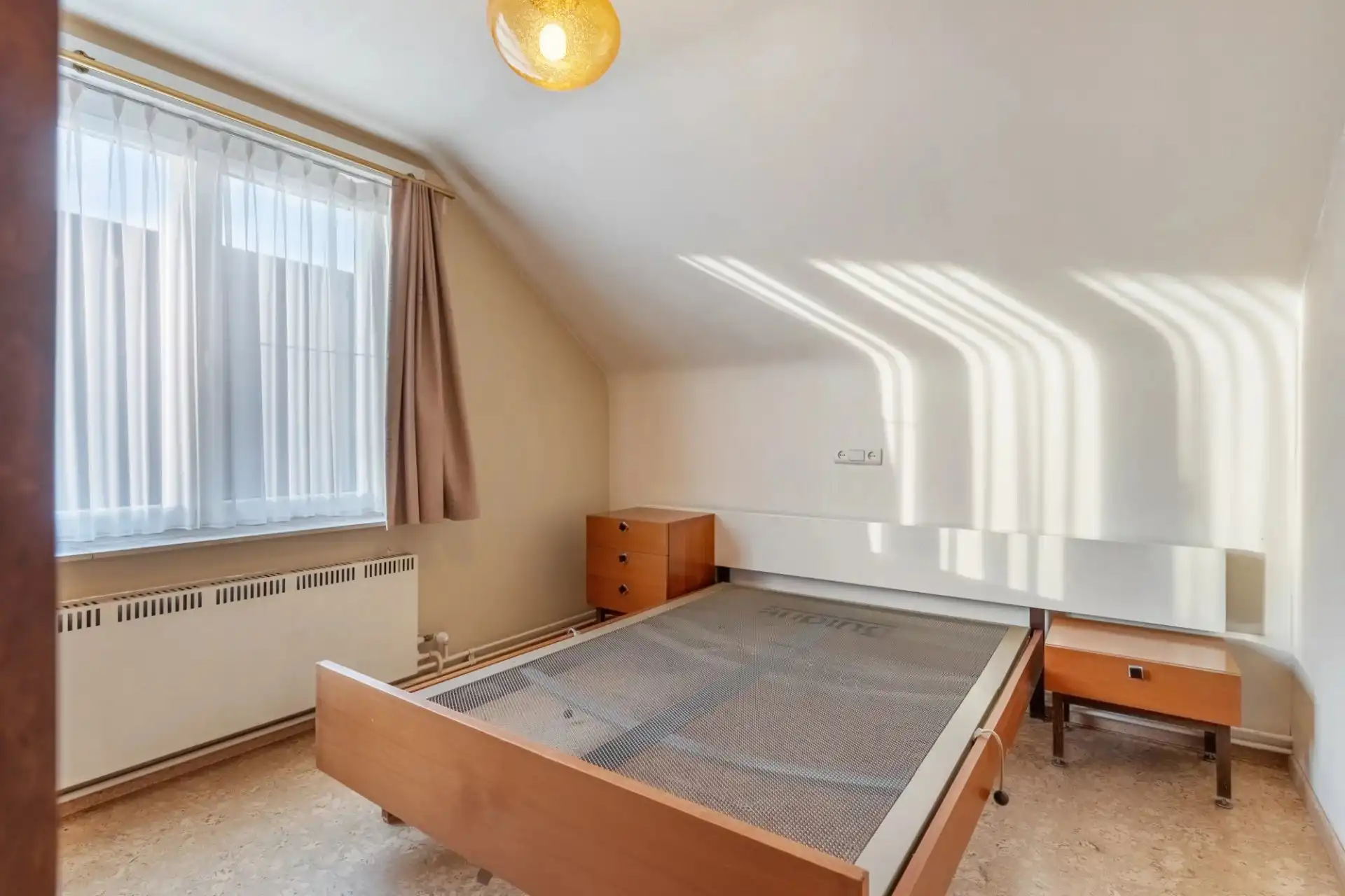 Ruime woning in rustige straat te Koersel foto 12