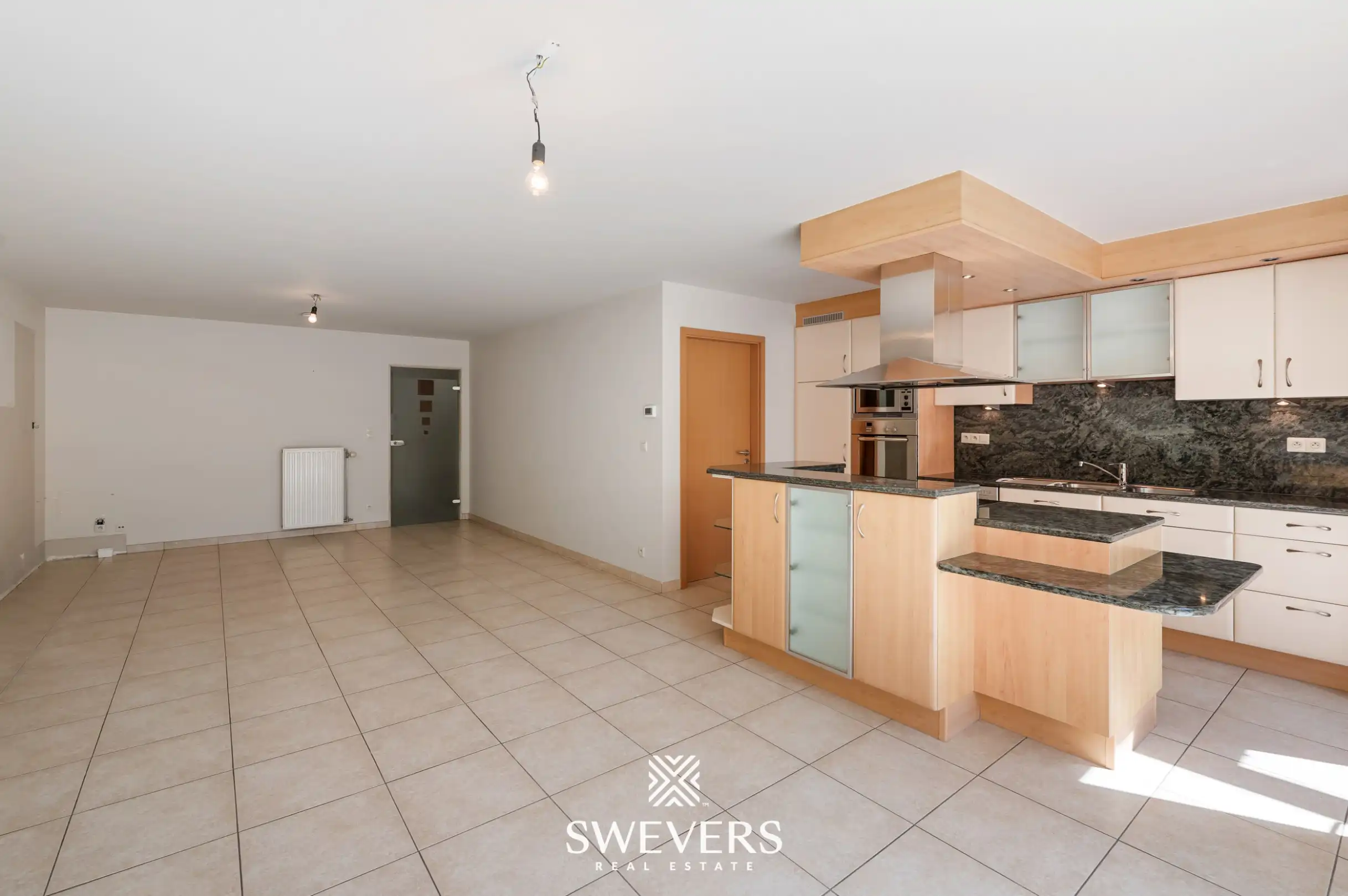 Gelijkvloers appartement met twee slaapkamers, ruime veranda en terras te Bree foto 5