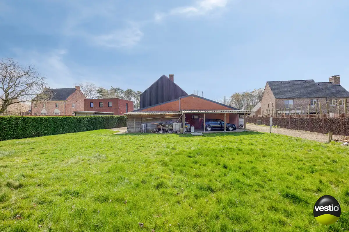 UNIEK BOUWPERCEEL VAN 16A VOOR OB MET AF TE BREKEN WONING TE ZUTENDAAL. foto 11