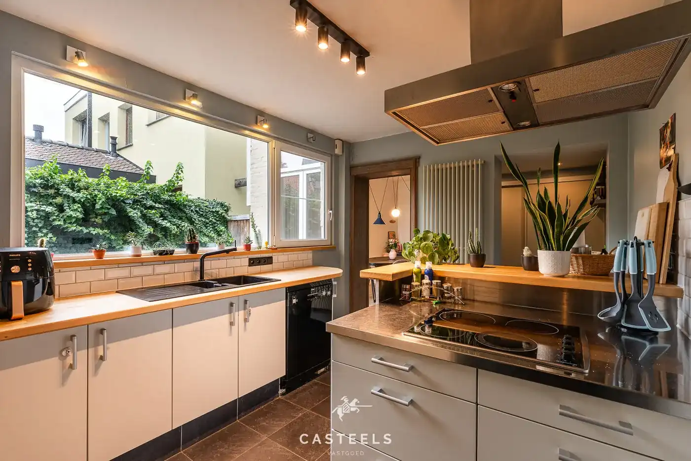 Centraal gelegen rijwoning met tuin in Sint-Denijs-Westrem foto 16