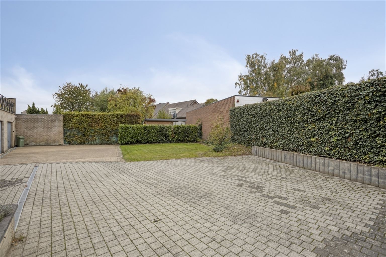 Ruim gelijkvloers appartement met gezellig, overdekt terras en ondergrondse garage, op een toplocatie vlak bij het centrum van Maaseik. foto 21