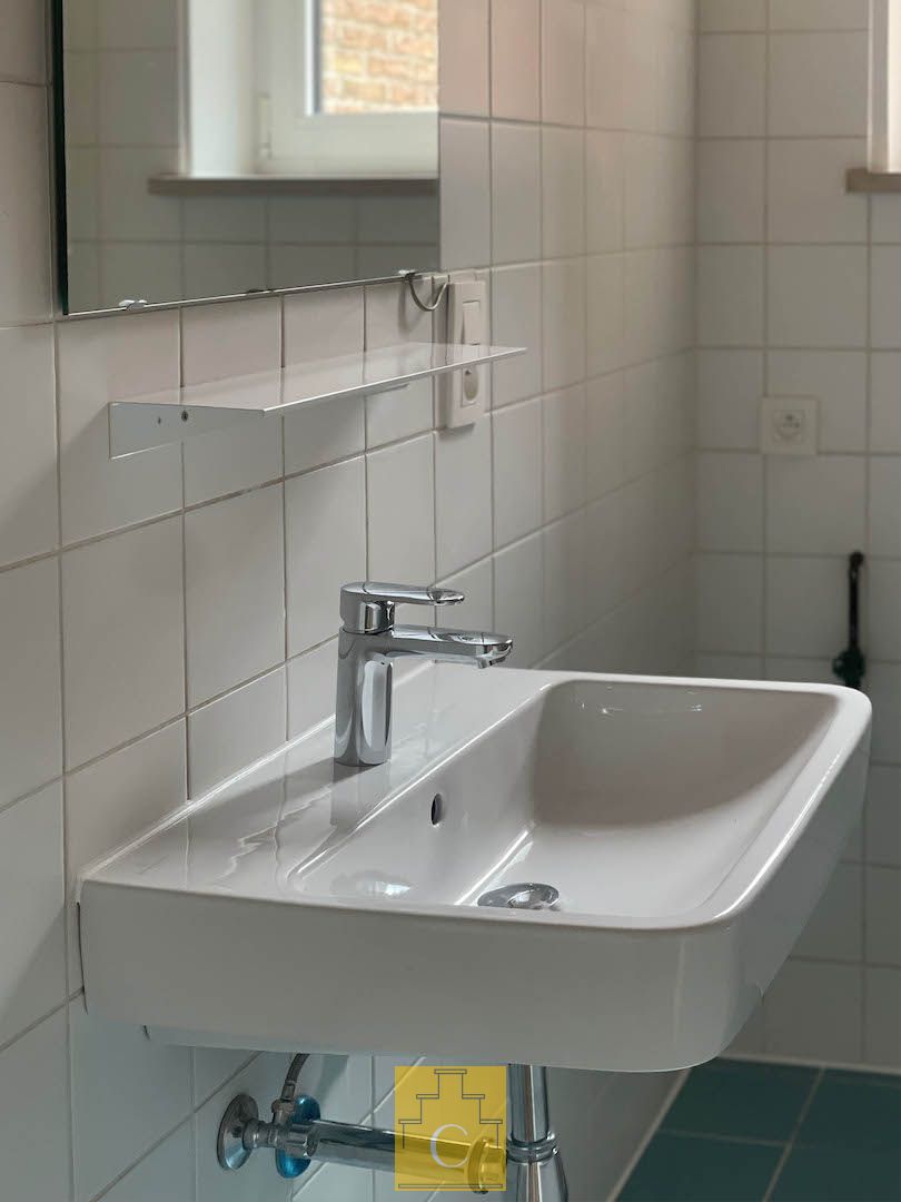 Instapklaar appartement met ruime terrassen en fietsenberging in hartje Brugge foto 23