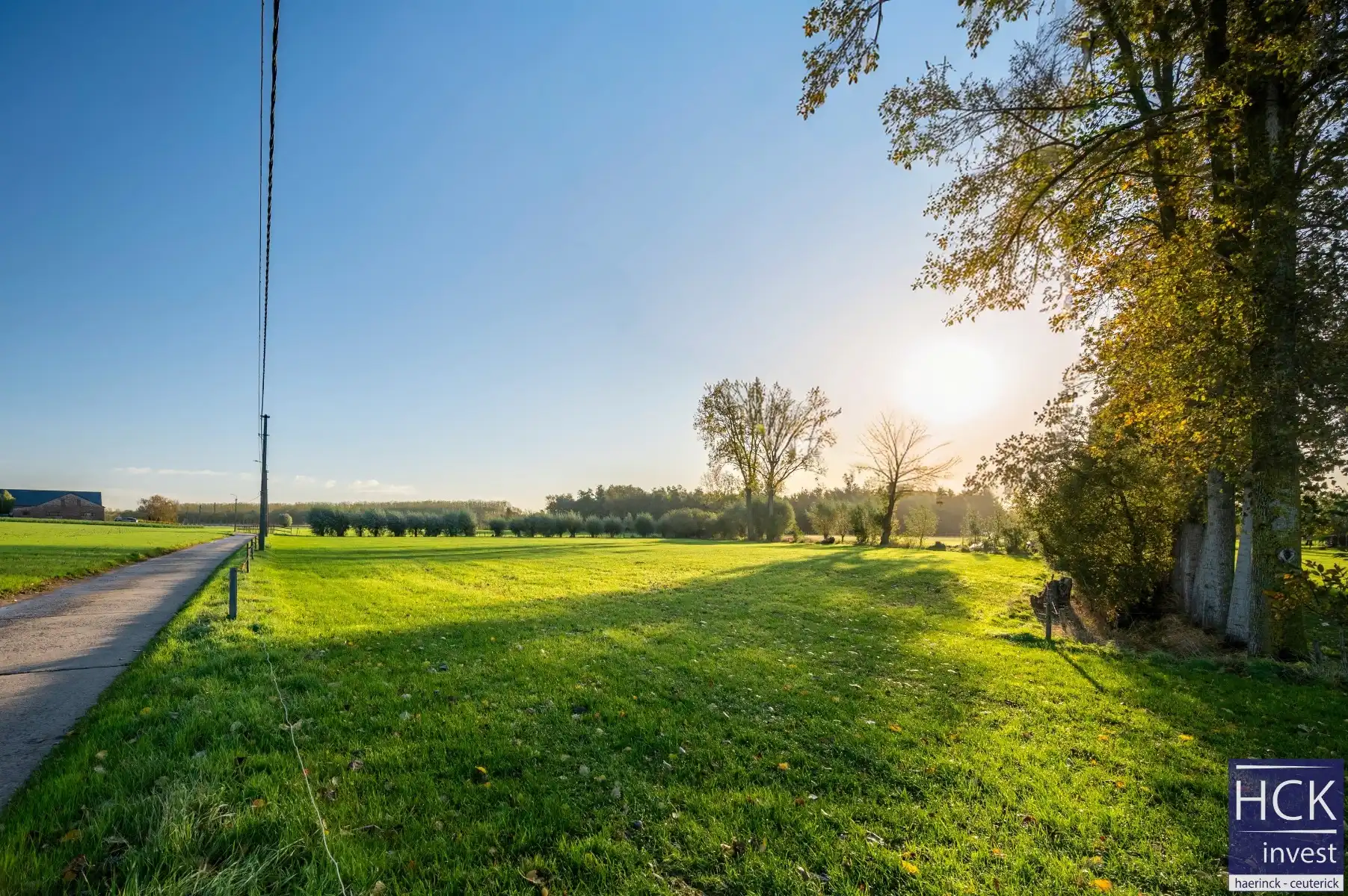 DEINZE - Mooi perceel landbouwgrond te Meigem 7250m² foto {{pictureIndex}}