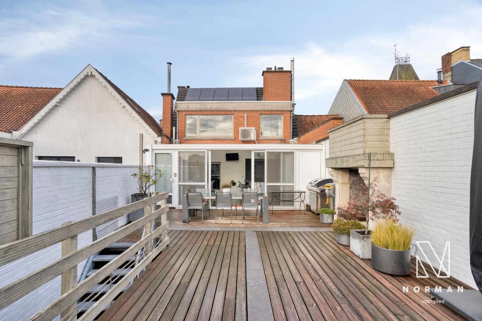 Duplex te koop in het centrum van Kuurne met 3 slaapkamers en een groot zongericht terras met tuinhuis.  foto 26
