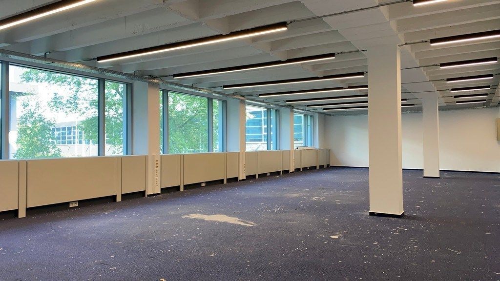 Ingedeelde instapklare kantoorruimte te huur in Bellevue Toren in Gent foto 3