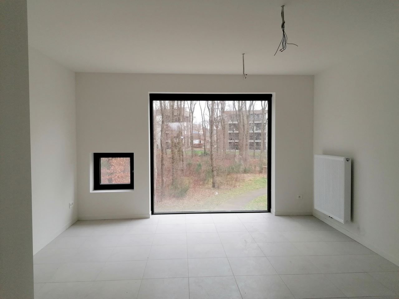 Genk, Busweg 3 bus 11 – Nieuwbouw-duplexappartement met 2 slaapkamers gelegen in een residentiële omgeving op wandelafstand van het centrum. foto 4