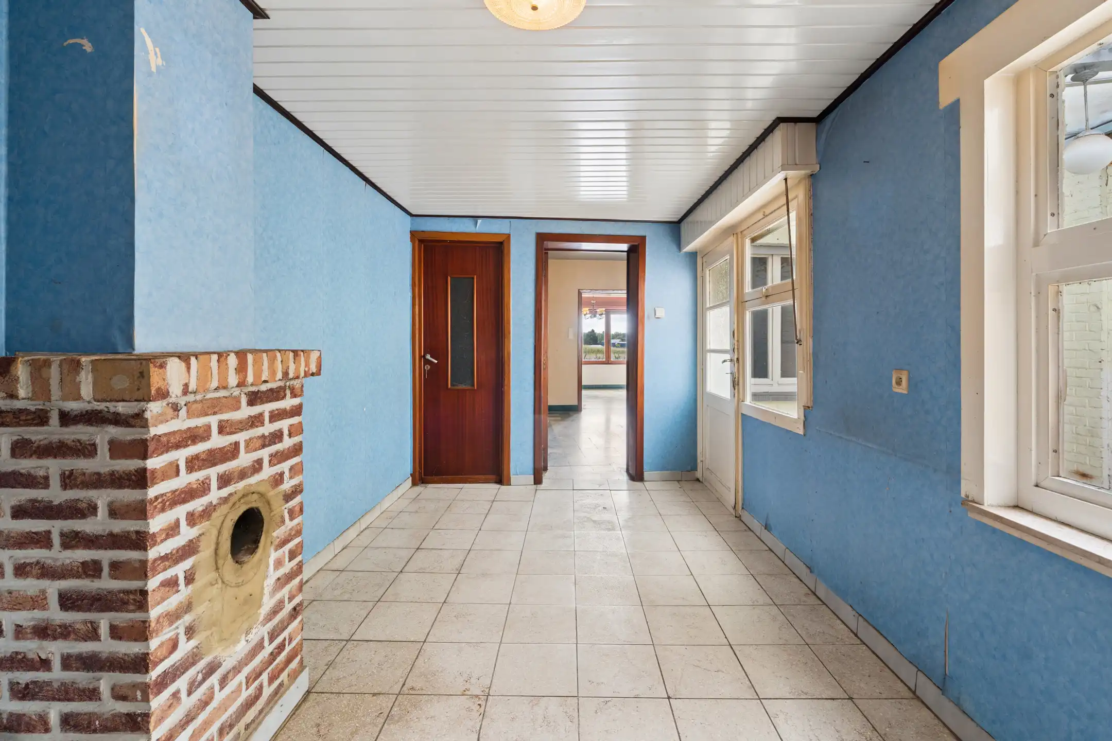 Te renoveren woning met tuin op centrale ligging foto 7