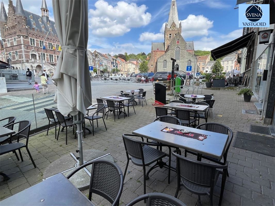 OPBRENGSTEIGENDOM BESTAANDE UIT 1 HANDELSZAAK EN 3 APPARTEMENTEN foto 2