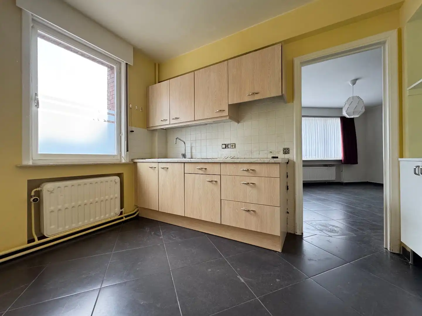 Ruim hoekappartement met garage foto 4