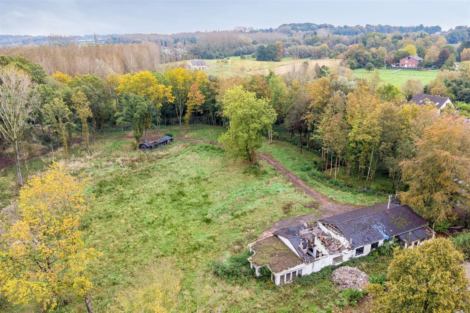 Bouwgrond in unieke groene omgeving in Asse  foto {{pictureIndex}}