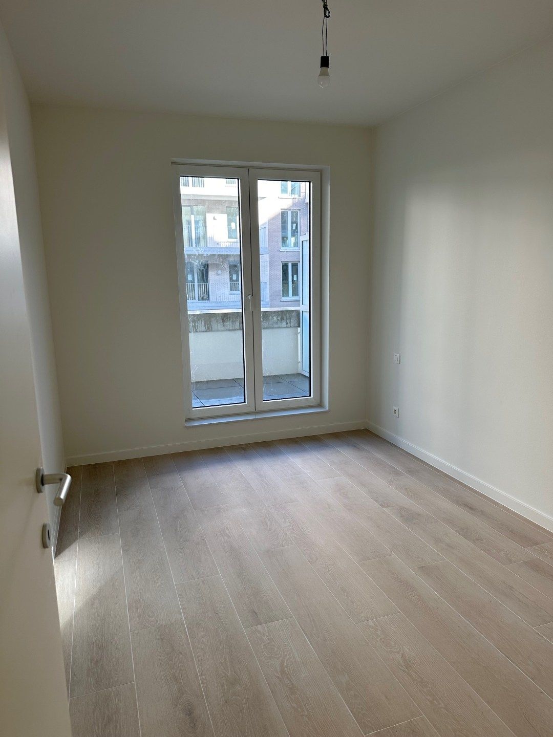 Prachtig nieuwbouwappartement met 2 slk, 2 terrassen en parking foto 14