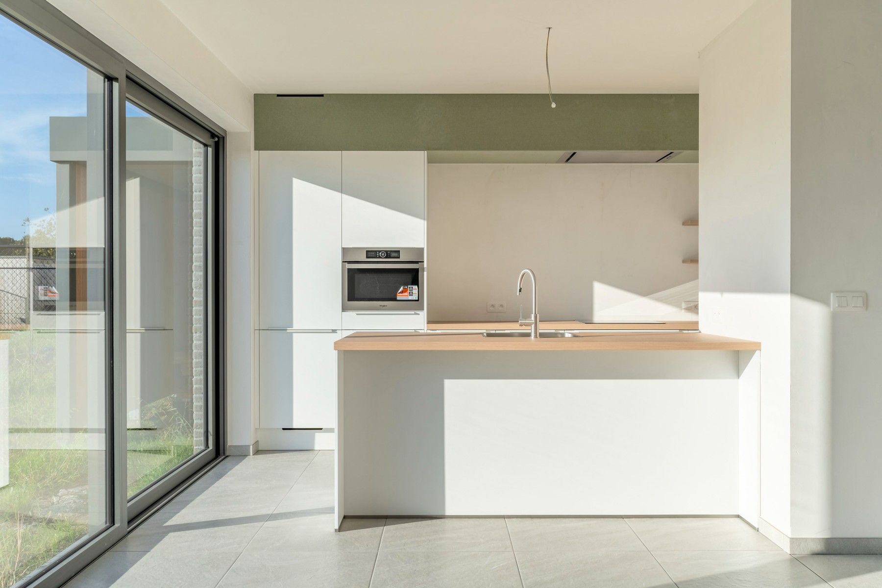 Lot 5: Halfopen bebouwing met 3 slpk., tuin en fietsberging foto 9