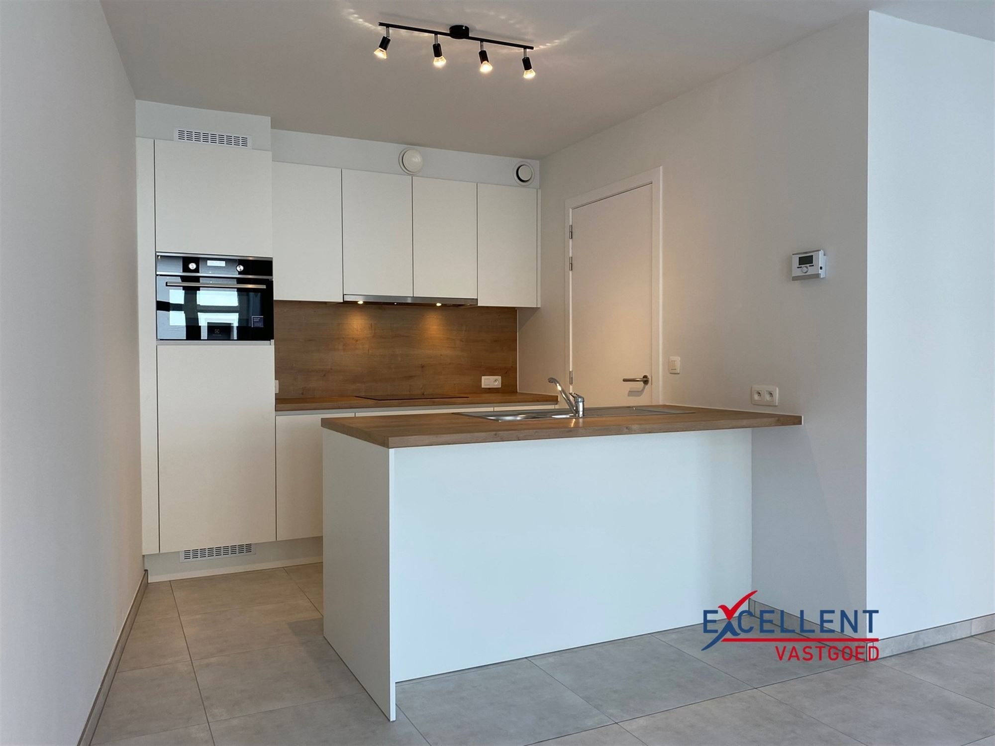 Nieuwbouw appartement met 1 slaapkamer en garage te huur in Vinkt (Deinze)! foto 5