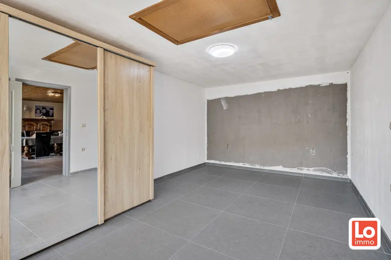 Landelijk gelegen half open woning met ruim bijgebouw (ca. 65m) en grote tuin met open zicht tussen Hijfte en Lochristi. foto 25