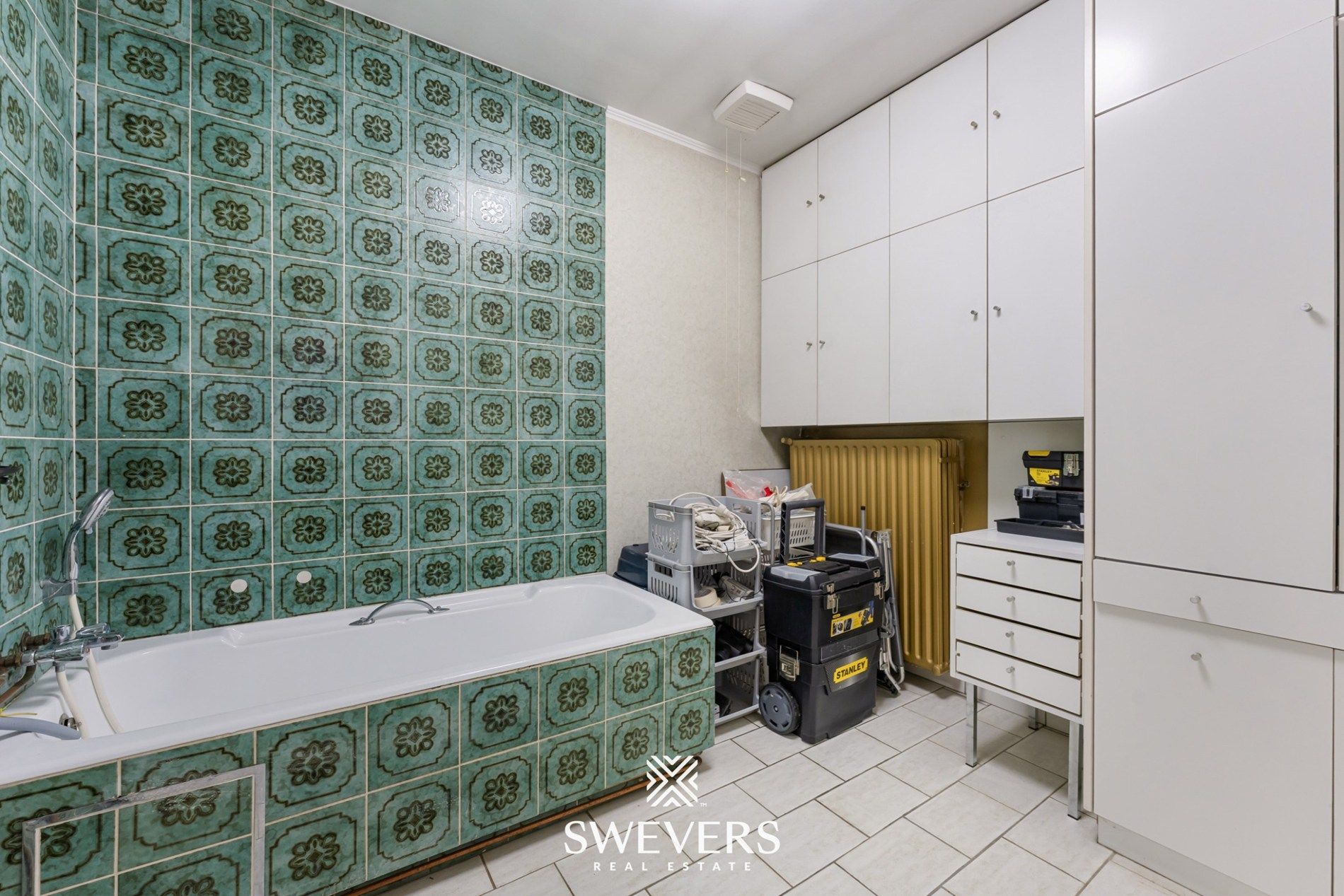 Opbrengsteigendom met handelspand, ruim appartement en uitbreidingspotentieel in hartje Heusden-Zolder foto 45