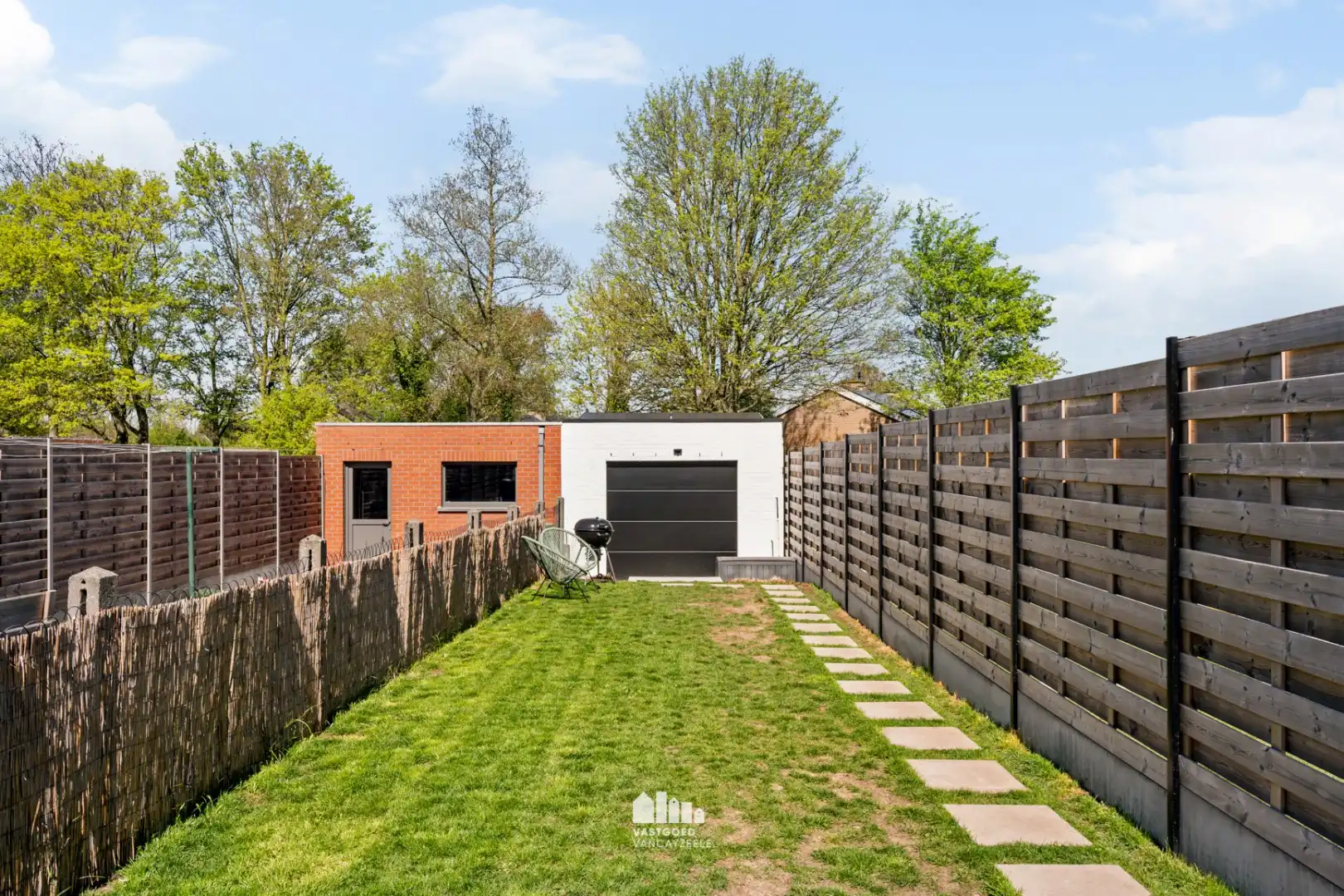 Volledig gerenoveerde woning met 5 slaapkamers, zonnige tuin en garage foto 19